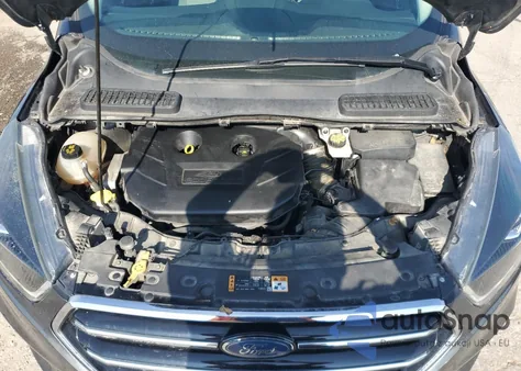 2017 Ford Escape Titanium z USA, uszkodzony, nr VIN 1FMCU9J99HUE93325